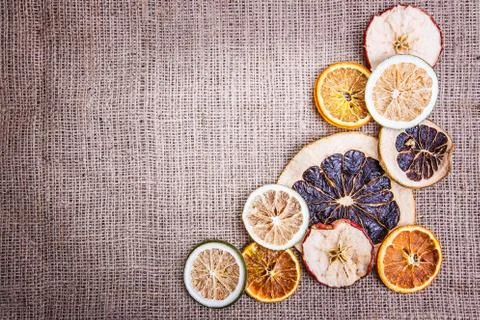 Burlap background  apple orange Stock Photos
