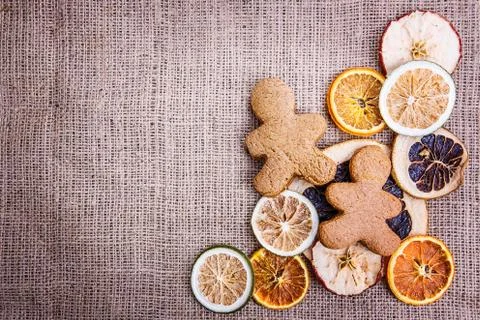 Burlap background  apple orange Stock Photos