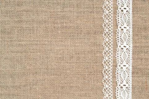 Burlap background with lac Stock Photos