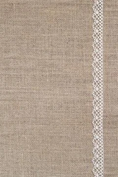 Burlap background with lace 스톡 사진