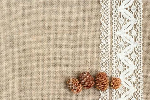 Burlap background with lace Stock Photos