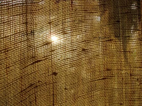 Burlap fabric texture abstraction with translucent light defocus Stock Photos