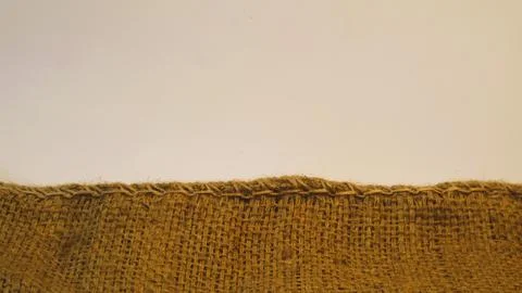 A burlap  isolated white background, textured backdrop for showcasing products Stock Photos