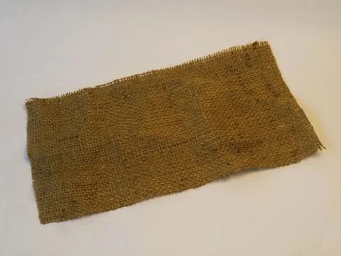 A burlap  isolated white background, textured backdrop for showcasing products Stock-Fotos