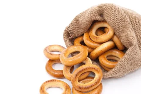 Burlap sack with bagels Stock Photos