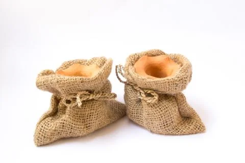 Burlap sack clay pots Stock Photos