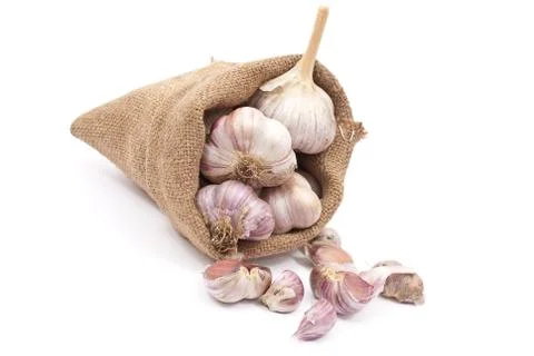 Burlap sack with garlic Stock Photos