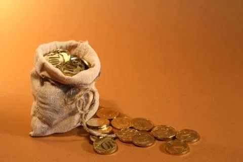 Burlap sack with money Stock Photos