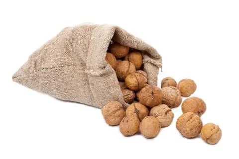 Burlap sack with walnuts Stock Photos
