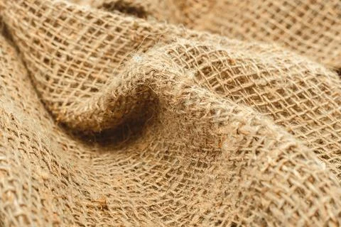 Burlap texture. Burlap fabric background with waves, folds and bruises Foto stock