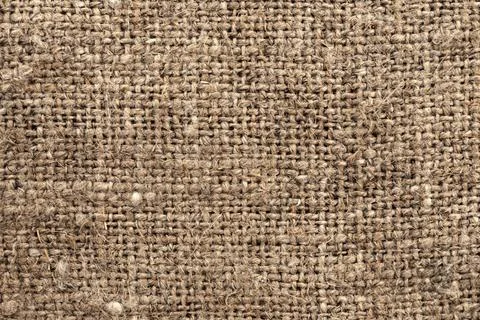 Burlap texture close up. Background from burlap fabric. Canvas Stock Photos