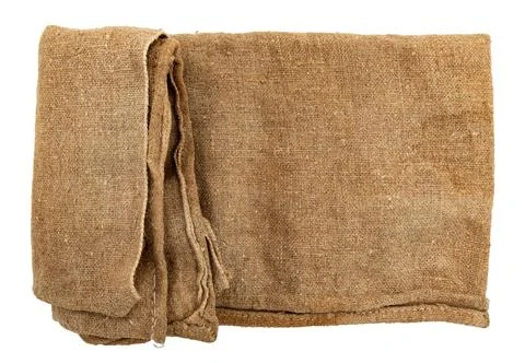 Burlap texture. A piece of torn burlap on a white background. Canvas. Packi.. Stock Photos