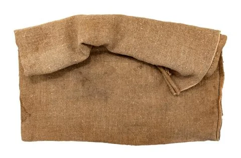 Burlap texture. A piece of torn burlap on a white background. Canvas. Packi.. Stock Photos