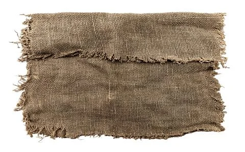 Burlap texture. A piece of torn burlap on a white background. Canvas. Packi.. Stock Photos