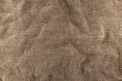 Burlap texture. A piece of torn burlap on a white background. Canvas. Packi.. Foto stock