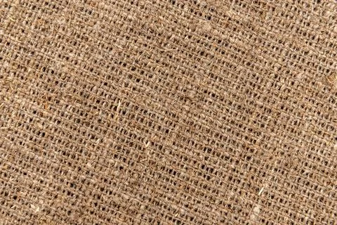 Burlap texture. A piece of torn burlap on a white background. Canvas. Packi.. Foto stock