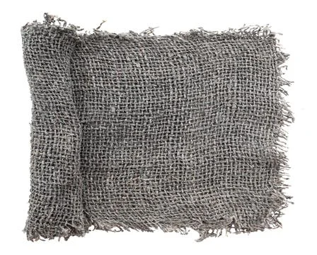 Burlap texture. A piece of torn burlap on a white background. Canvas. Packi.. Stock Photos