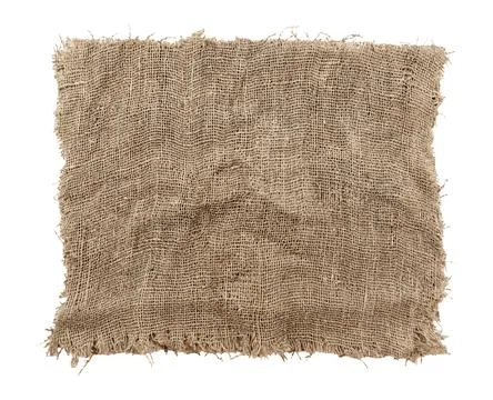 Burlap texture. A piece of torn burlap on a white background. Canvas. Packi.. Stock Photos