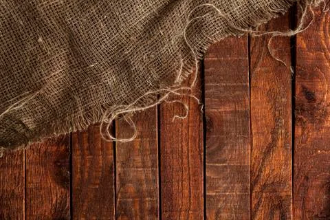 Burlap texture on wooden table Foto stock