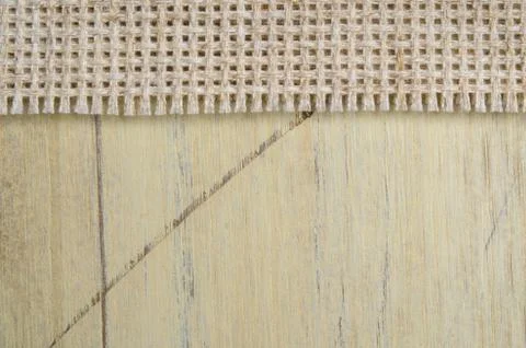 Burlap texture on wooden table Stock Photos