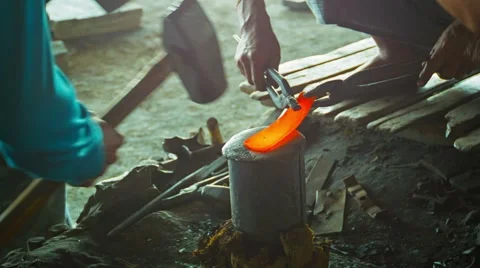 Burmese blacksmiths work in the forge. manufacture of weapons in the traditio Video stock 40975439