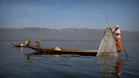 Burmese local fishermen with authentic techniques  Stock Footage 104122051