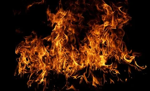 Burn effect pattern. Fire flames on black background. Burning fire backdrop Stock Photos