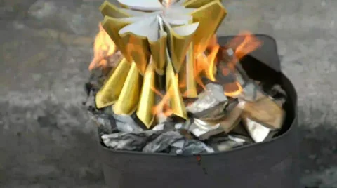 Burn goldend and silver paper Stock Footage 36027235