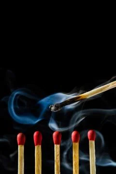 Burn match with smoke Stock Photos