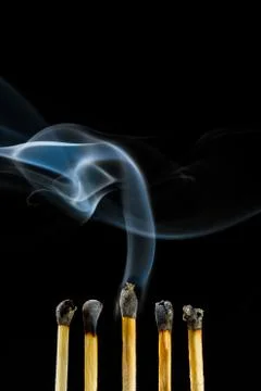 Burn match with smoke Stock Photos