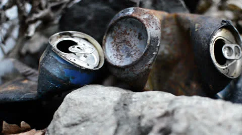 Burned beer cans track right Stock Footage 24849310