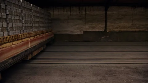 Burned Brick Stacks Are Transported From Left To Right On Factory Train Stock Footage 155446904