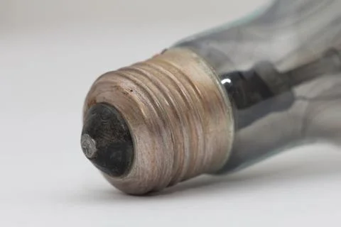 Burned bulb on white background Stock Photos