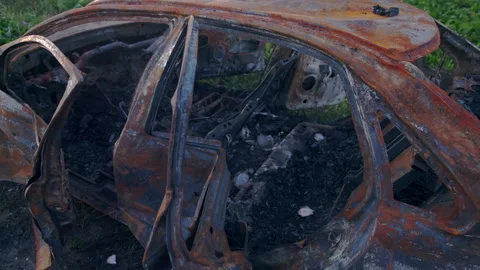 Burned car. Deformed fire machine. Consequences of car accident. Damaged by Stock Footage 144422822