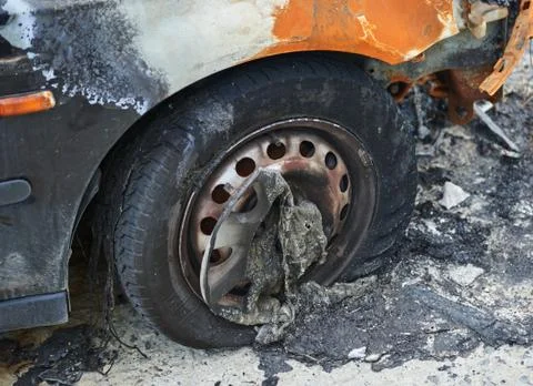 Burned car parked Stock Photos