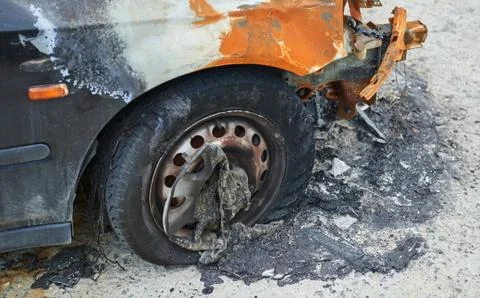 Burned car parked Stock Photos
