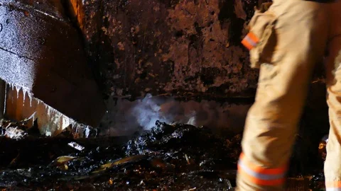 Burned detritus at structure fire 動画素材 116013429