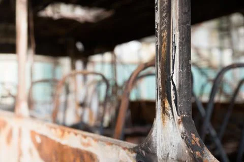 Burned down bus, view from outside, space for text Stock Photos