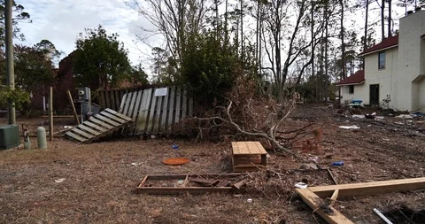 Burned down gutted house tracking shot caused by Hurricane Michaels storm surge Stock Footage 98763433