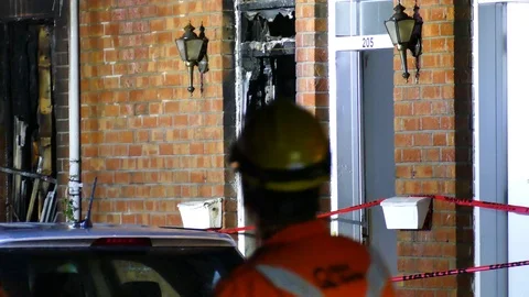 Burned entry at building fire Stock Footage 116710065
