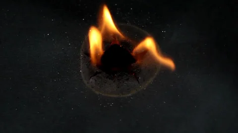 Burned fire on  black paper background Stock Footage 36437893