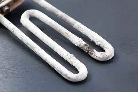 Burned heating element found in an appliance after malfunction during use Stock-Fotos