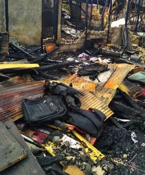 Burned house interior after fire, ruined building room inside, disaster or .. Stock Photos