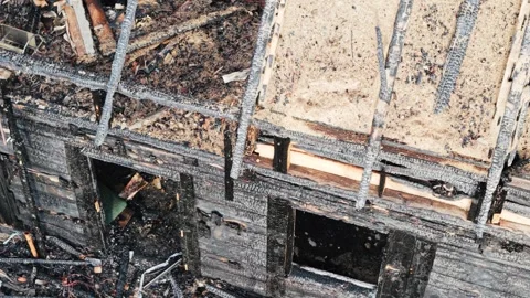 Burned House Symbolizing Disaster Response and Property Loss Risk Stock Footage 340596735