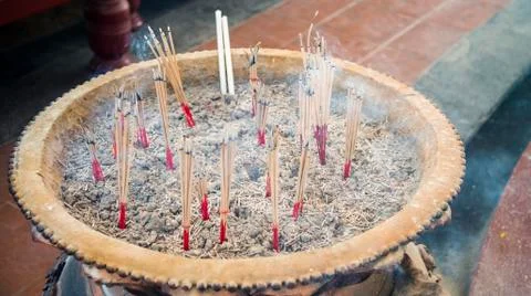 Burned joss stick in the pot Stock Photos