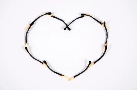 Burned love. Stock Photos