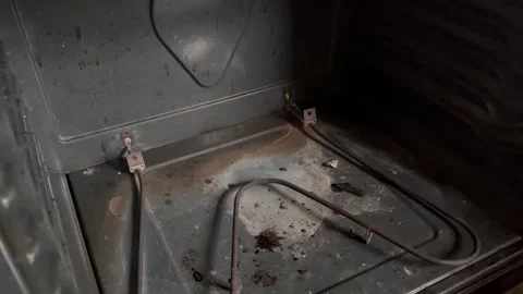 A burned out heating element in kitchen stove Stock Footage 323762812