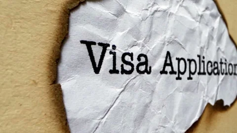 Burned Paper Background Highlighting the Word Visa Application Stock Footage 315007725