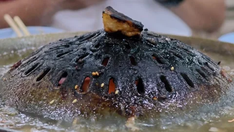 Burned Thai grilled BBQ pan. Carcinogenic and cancer. Dirty Dishes concept. Stock Footage 306992472
