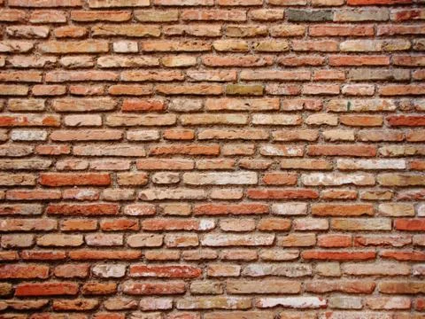 Burned Tile Brick Wall in Warm Red Colors Foto stock